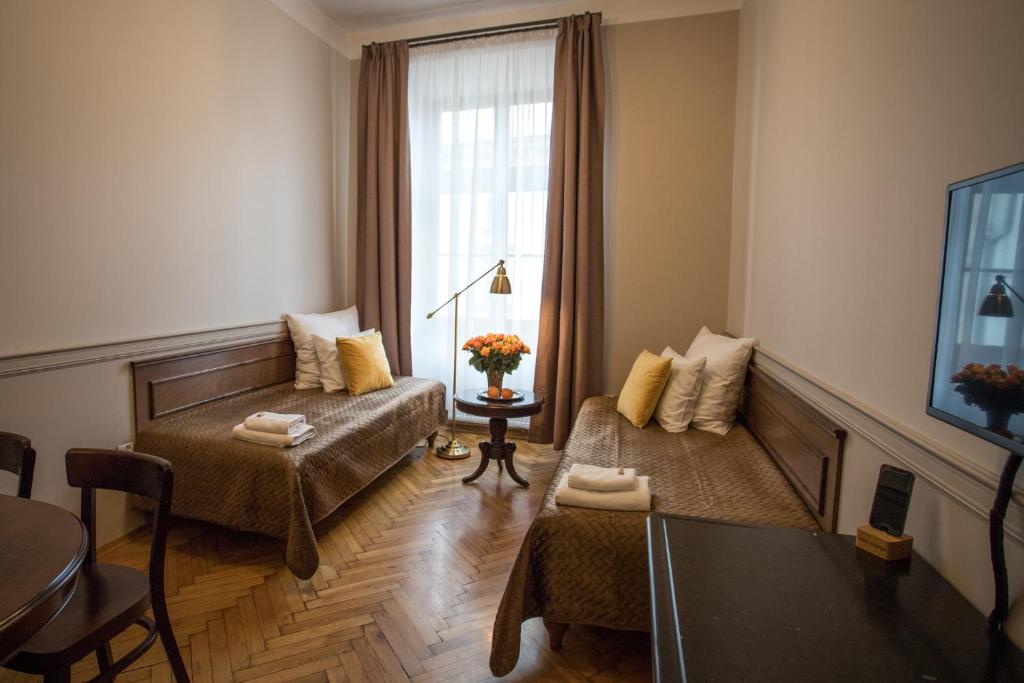 Posteľ alebo postele v izbe v ubytovaní Scharffenberg Apartments Main Square