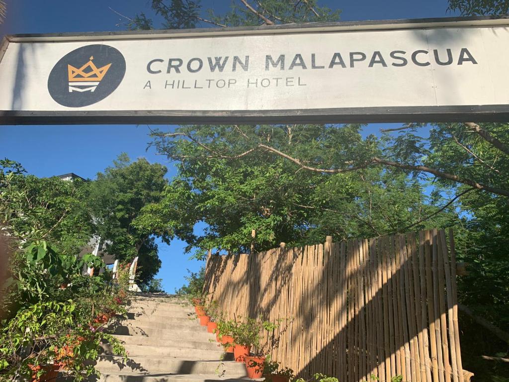 Certifikát, hodnocení, plakát nebo jiný dokument vystavený v ubytování Crown Malapascua