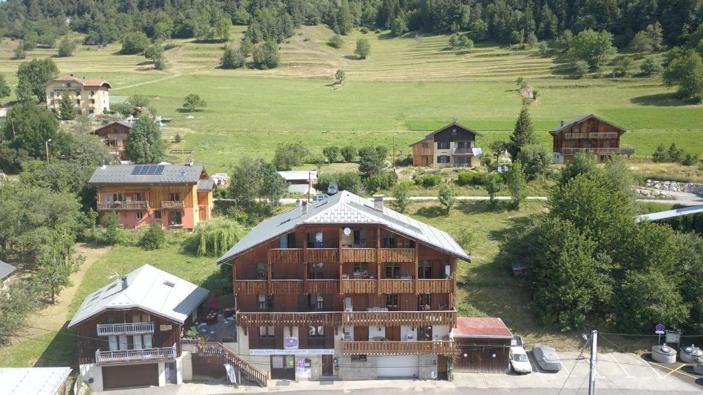 an aerial view of a large building in a village at Chalet de la Yodine in Feissons-sur-Salins