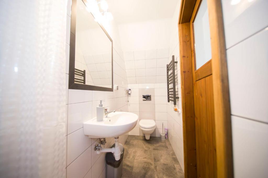 Kúpeľňa v ubytovaní Apartamenty Harenda 39