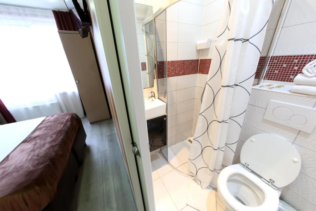 Koupelna v ubytování Hotel Phenix