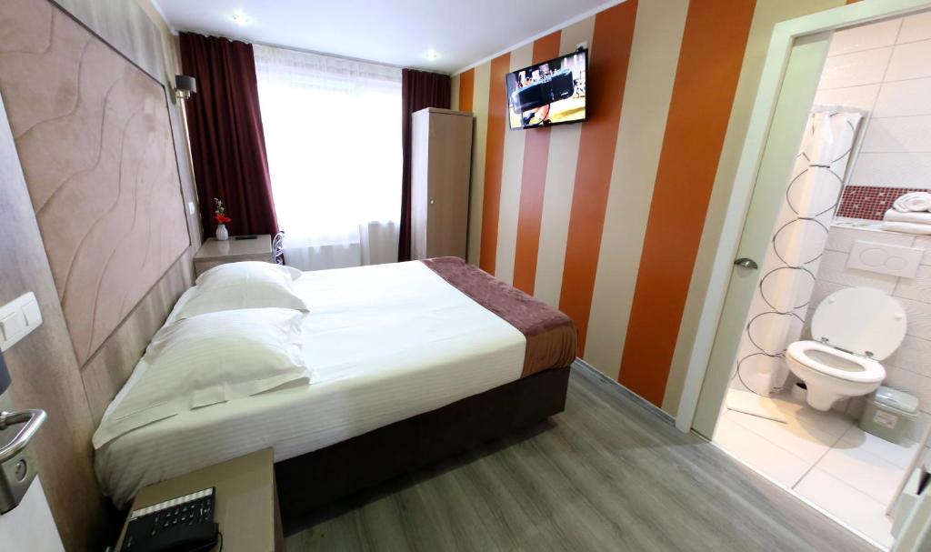 Koupelna v ubytování Hotel Phenix