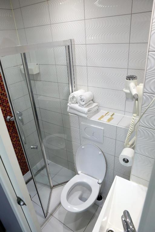 Koupelna v ubytování Hotel Phenix