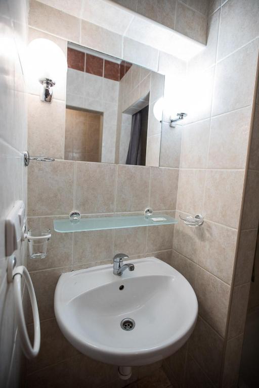 Koupelna v ubytování A-Sport Hotel