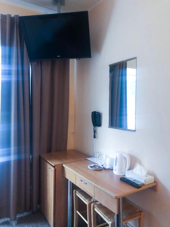 TV a/nebo společenská místnost v ubytování Hotel Yes