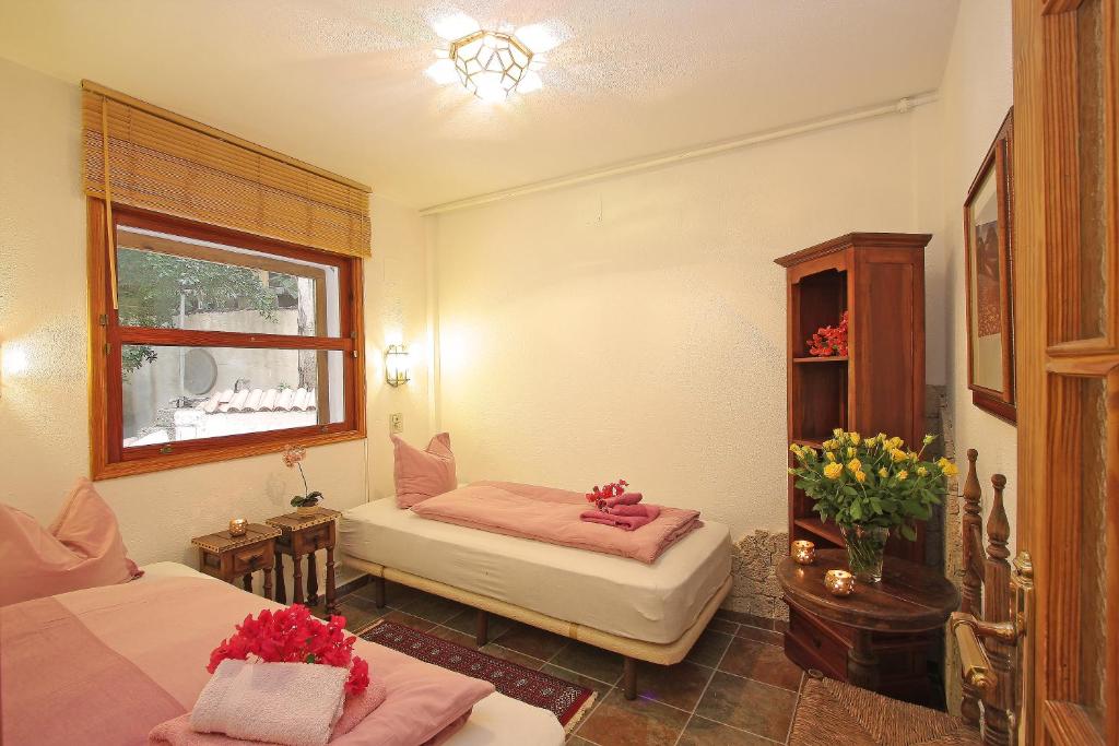 Postel nebo postele na pokoji v ubytování Villa Castillo Moro