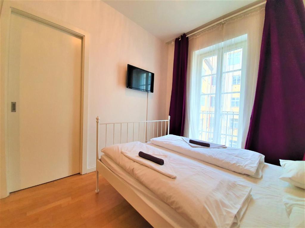 Postel nebo postele na pokoji v ubytování Apartment Sophia