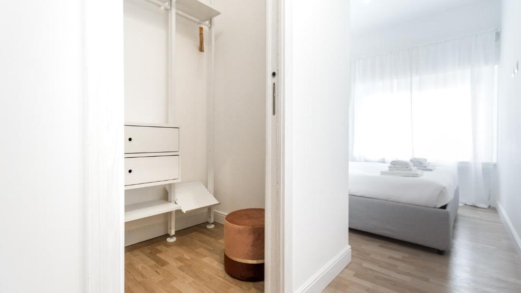 A bed or beds in a room at Italianway - Brianza 28