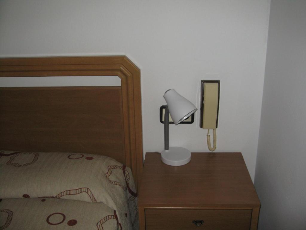Postel nebo postele na pokoji v ubytování Hostal Fontdemora