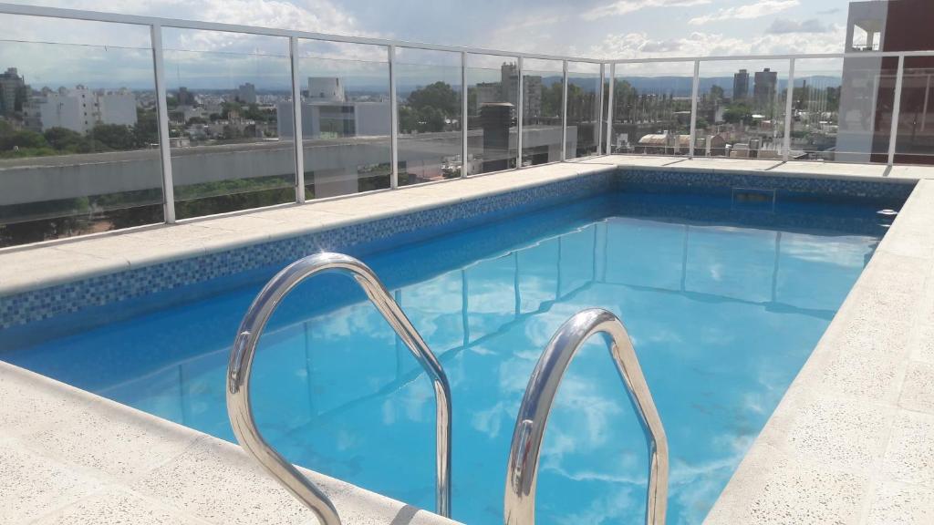 Bazén v ubytování DPTO ALTA CORDOBA nebo v jeho okolí