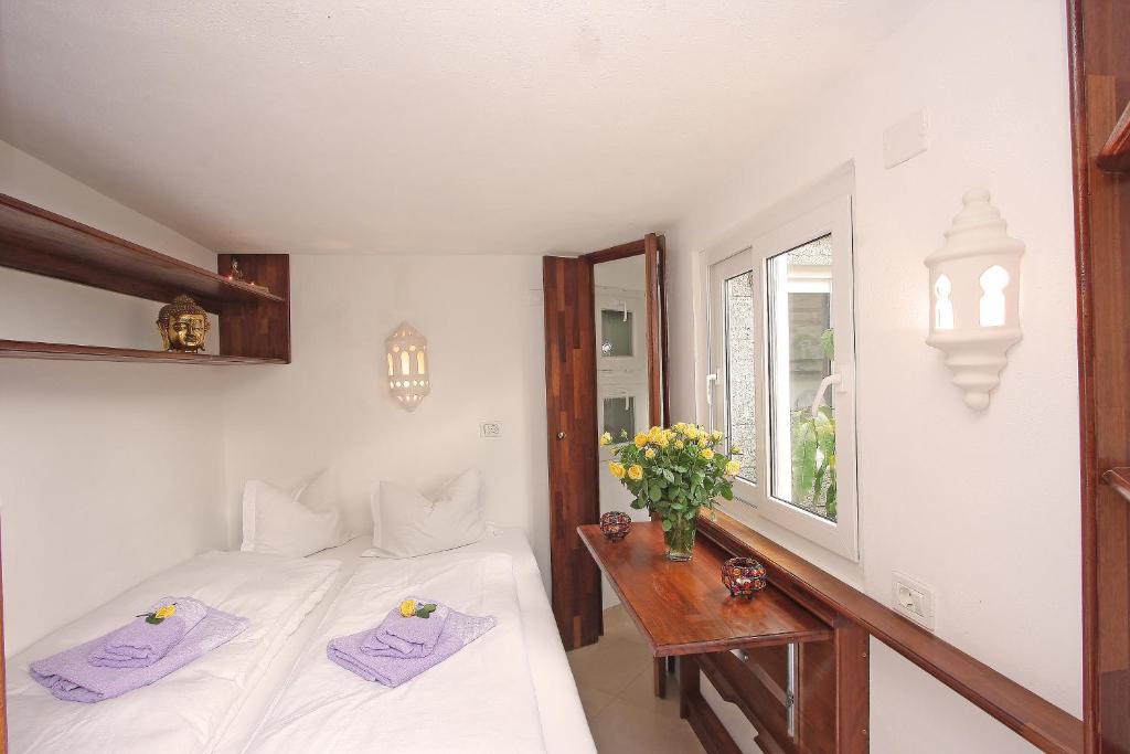 Postel nebo postele na pokoji v ubytování Villa Castillo Moro