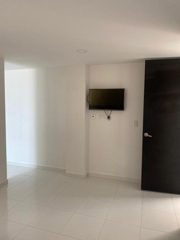 TV a/nebo společenská místnost v ubytování Hotel Paradisus