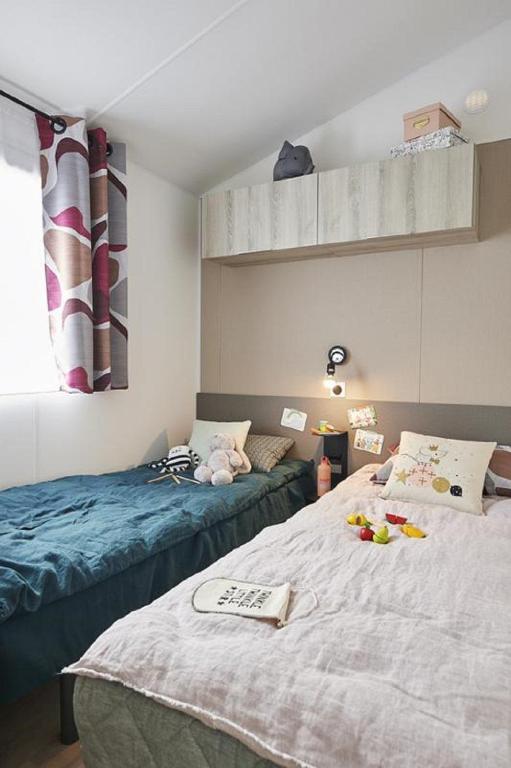Postel nebo postele na pokoji v ubytování MOBILE HOME FOR YOU