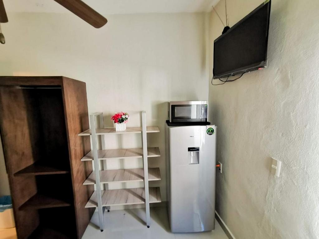 Kuchyň nebo kuchyňský kout v ubytování Posada Bugambilia