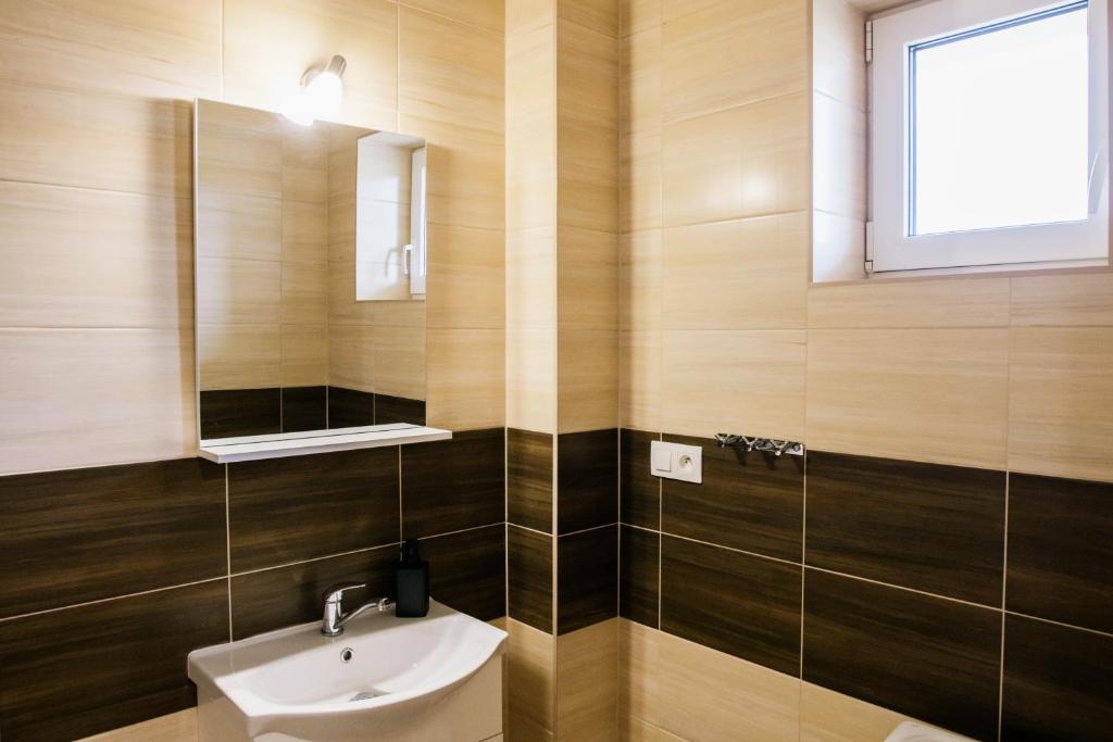 Koupelna v ubytování Jazmin apartmány