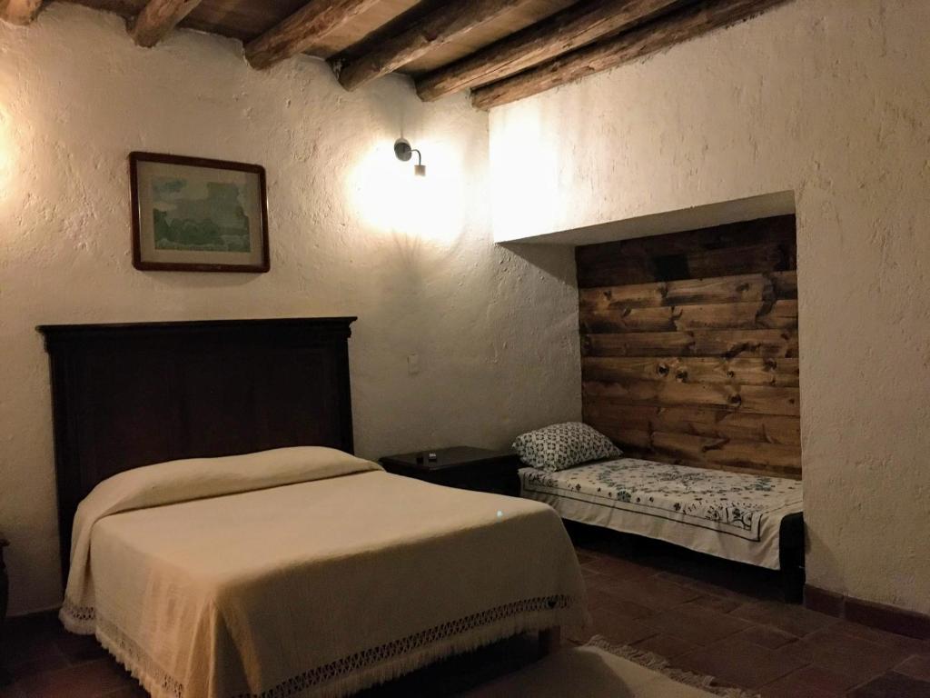Postel nebo postele na pokoji v ubytování Hotel Del Rio