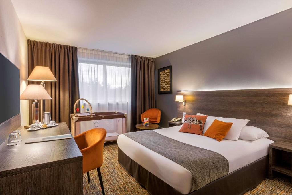 Postel nebo postele na pokoji v ubytování Best Western Plus Hotel Admiral