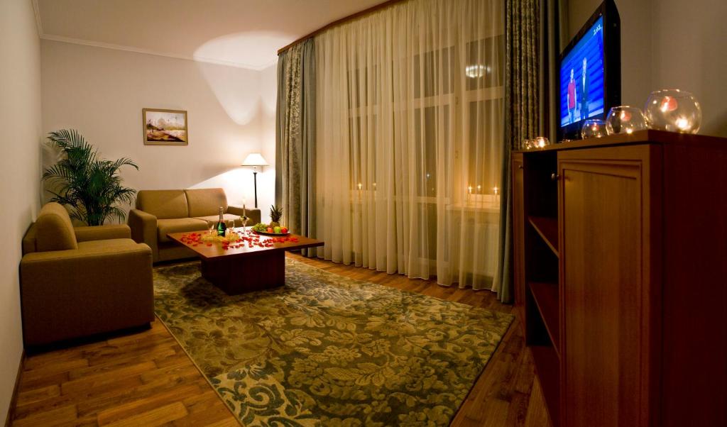 TV a/nebo společenská místnost v ubytování Hotel Re Vita