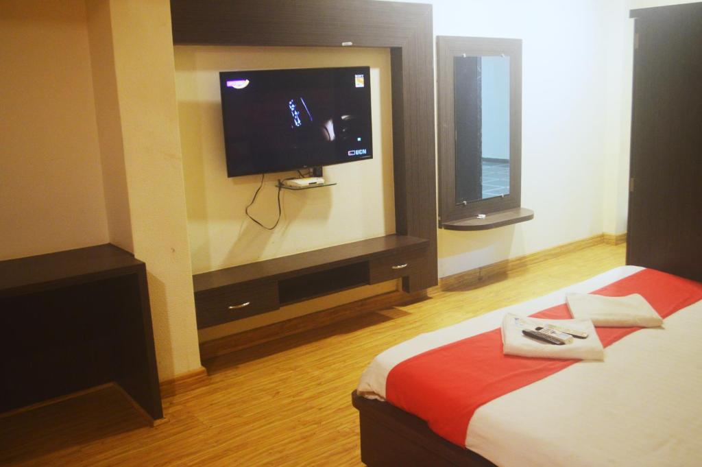 TV a/nebo společenská místnost v ubytování Hotel Sunrise N Resorts