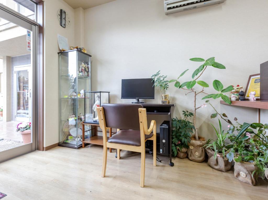 TV a/nebo společenská místnost v ubytování Tabist International Hotel Kaike