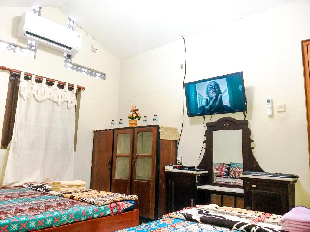 TV o dispositivi per l'intrattenimento presso Ngampilan Backpacker Hostel