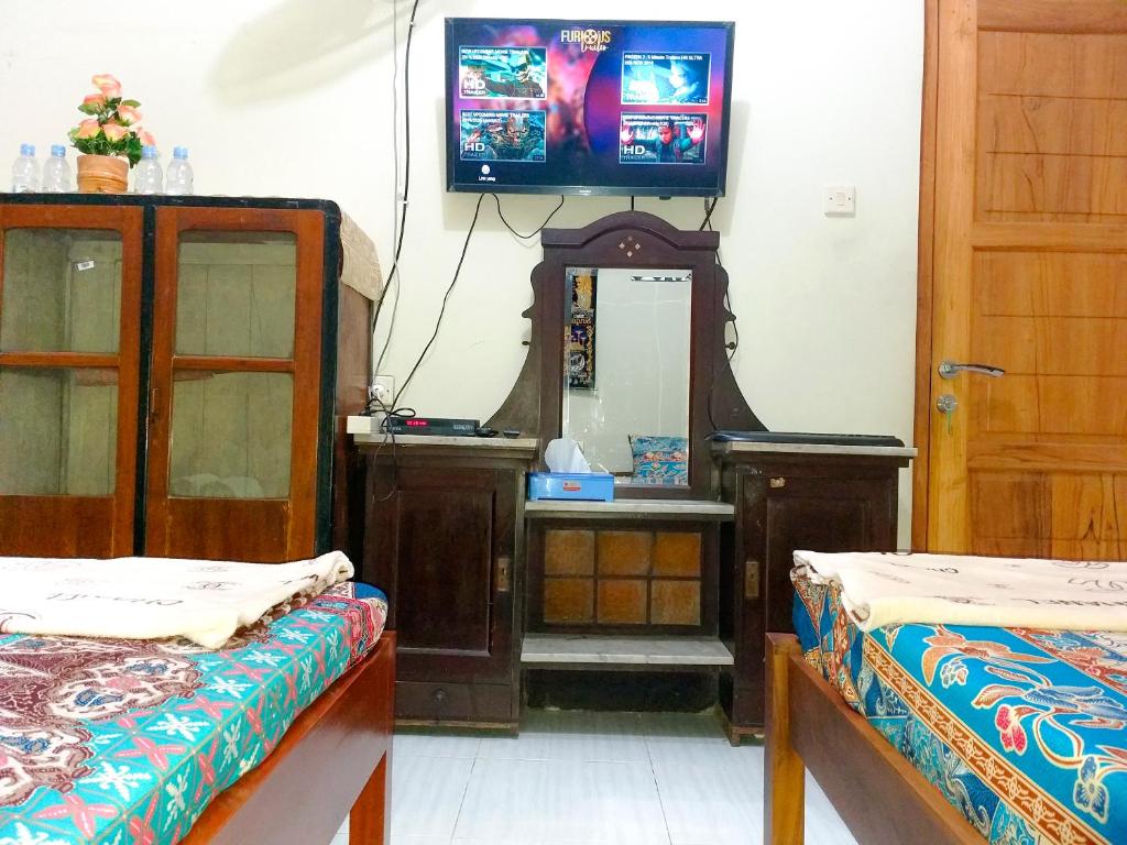 TV o dispositivi per l'intrattenimento presso Ngampilan Backpacker Hostel