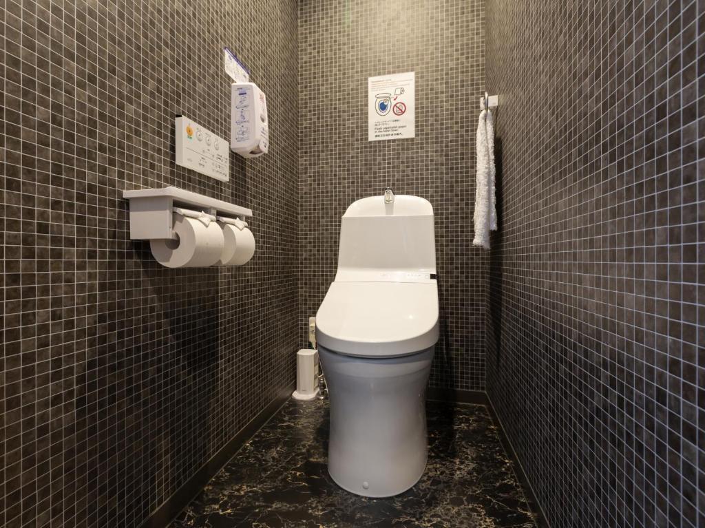 Koupelna v ubytování Tabist International Hotel Kaike