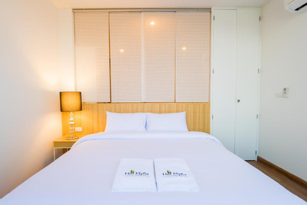 Postel nebo postele na pokoji v ubytování Hill Myna Condotel Official Account
