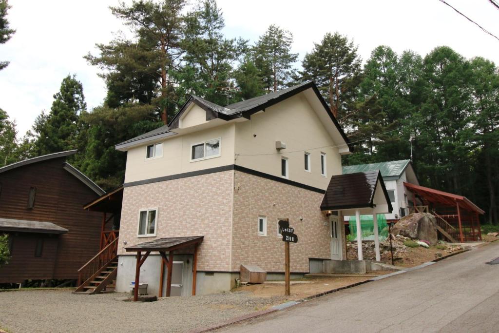 a house being constructed on the side of a street at Cottage All Resort Service / Vacation STAY 8444 in Inawashiro