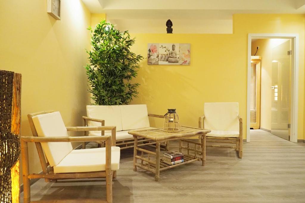 Posezení v ubytování REGIOHOTEL Quedlinburger Hof Quedlinburg