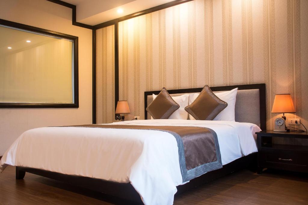 Postel nebo postele na pokoji v ubytování Friendship hotel