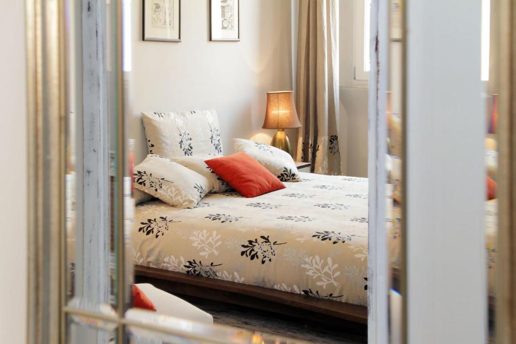 Uma cama ou camas num quarto em Restart Accommodations Rome