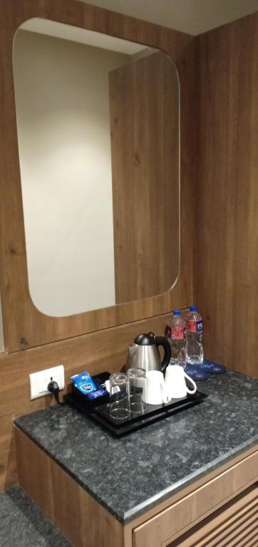 Kuchyň nebo kuchyňský kout v ubytování Cosmique Clarks Inn Suites Goa