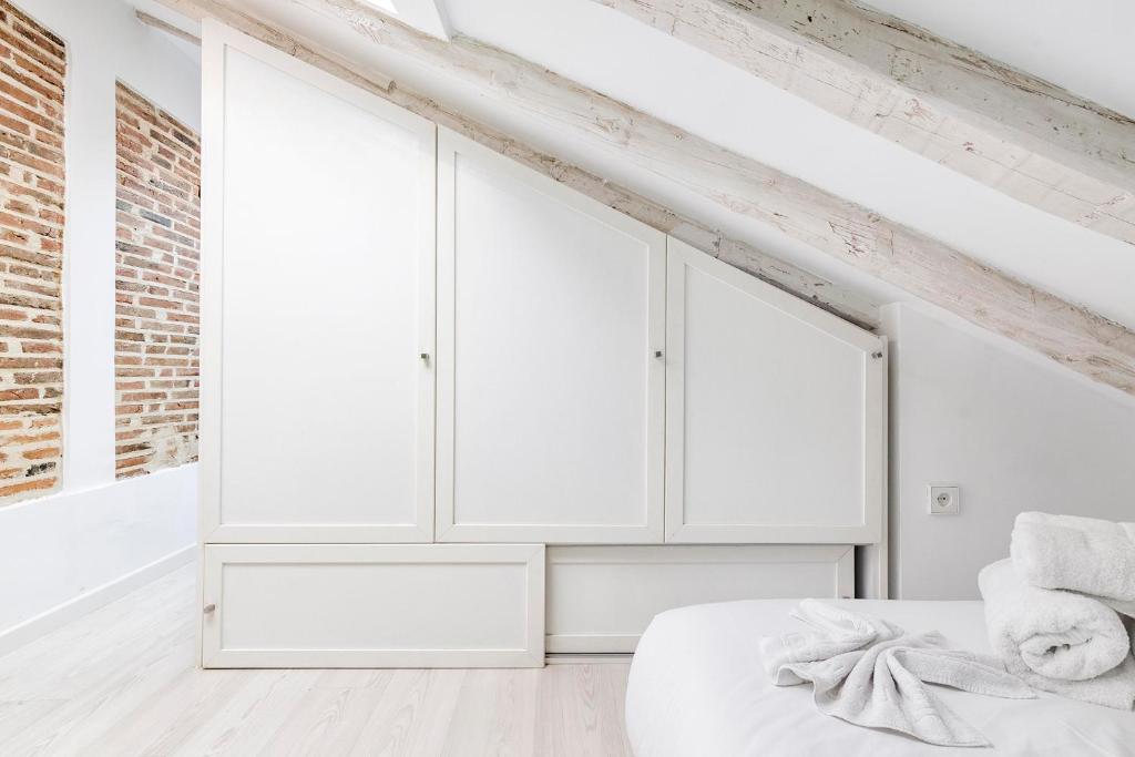 Postel nebo postele na pokoji v ubytování Fabuloso estudio en pleno centro de Madrid.