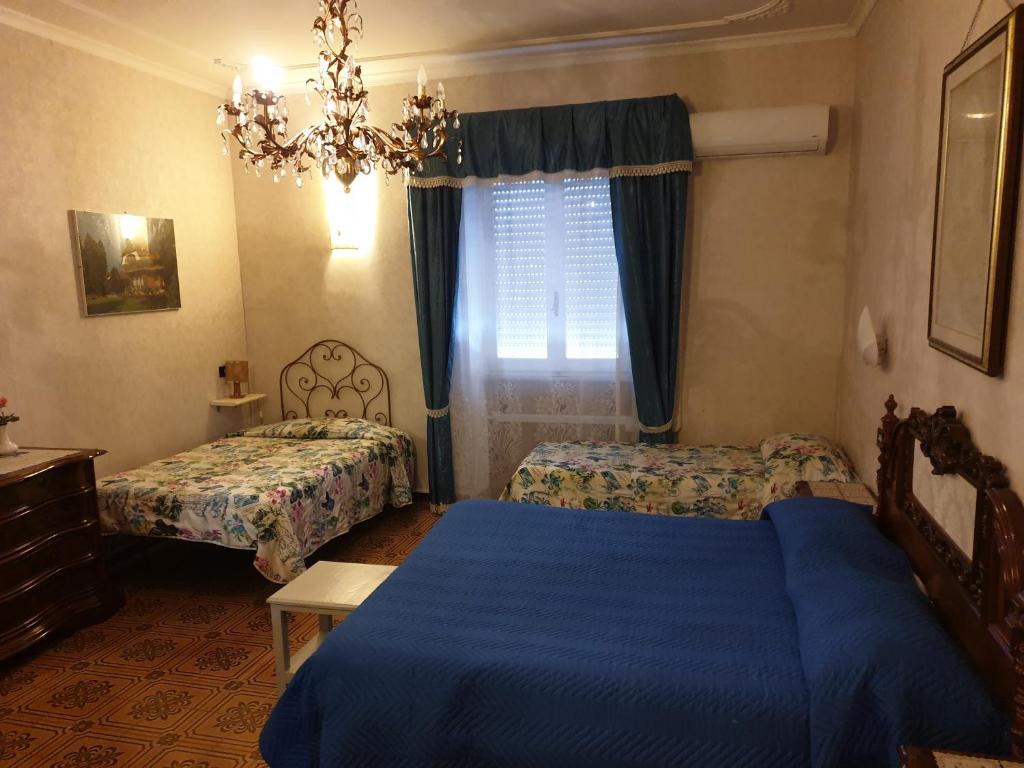 Postel nebo postele na pokoji v ubytování Hotel Ristorante Bagnaia