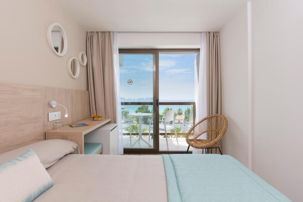 Postel nebo postele na pokoji v ubytování HSM Linda Playa