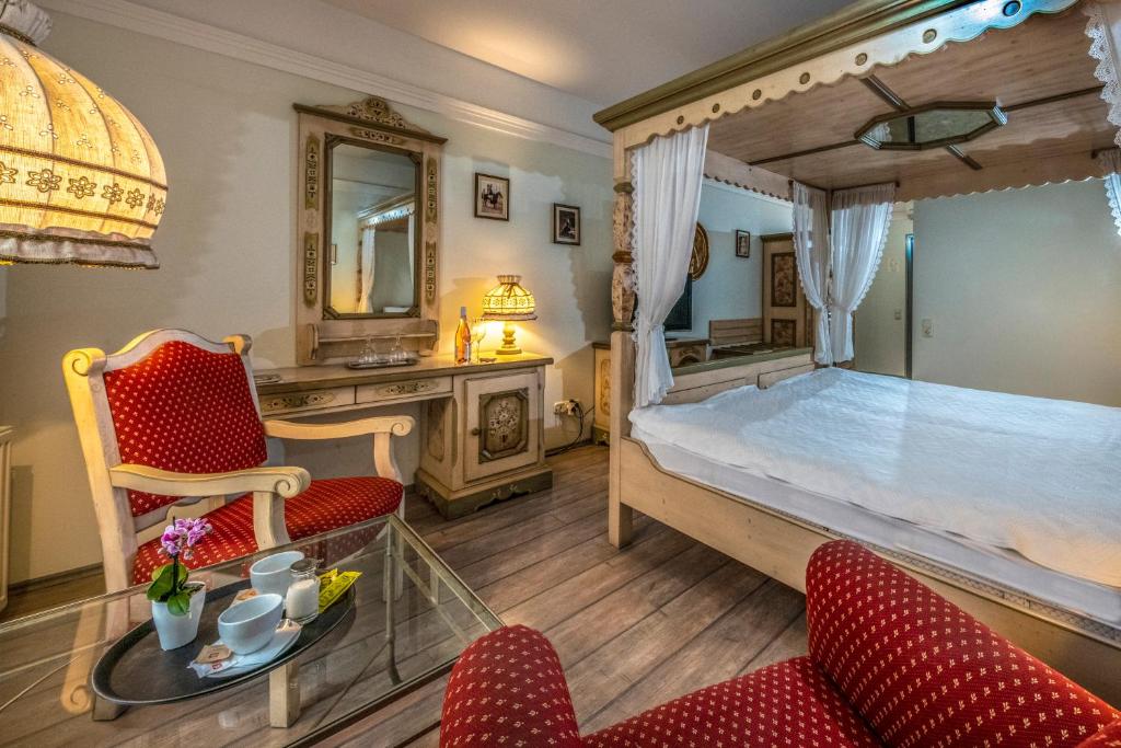 Postel nebo postele na pokoji v ubytování Corvin Hotel Budapest Sissi Wing