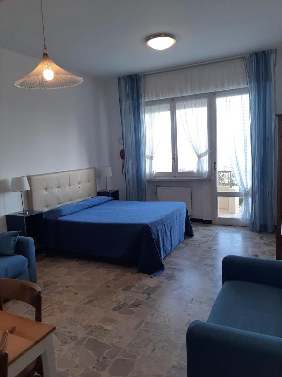 Postel nebo postele na pokoji v ubytování Residence Sole