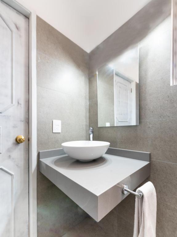 Koupelna v ubytování Suites Internacional