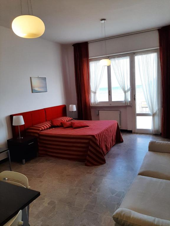 Postel nebo postele na pokoji v ubytování Residence Sole