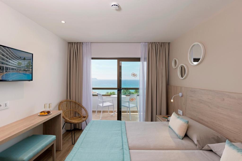 Postel nebo postele na pokoji v ubytování HSM Linda Playa