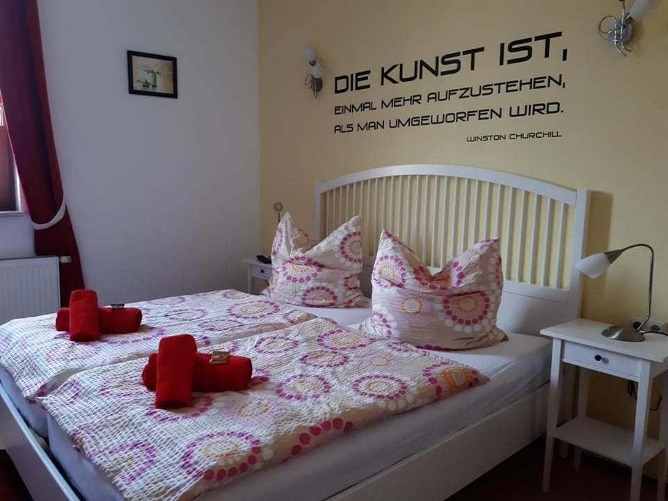 Postel nebo postele na pokoji v ubytování Scharfer Kessel