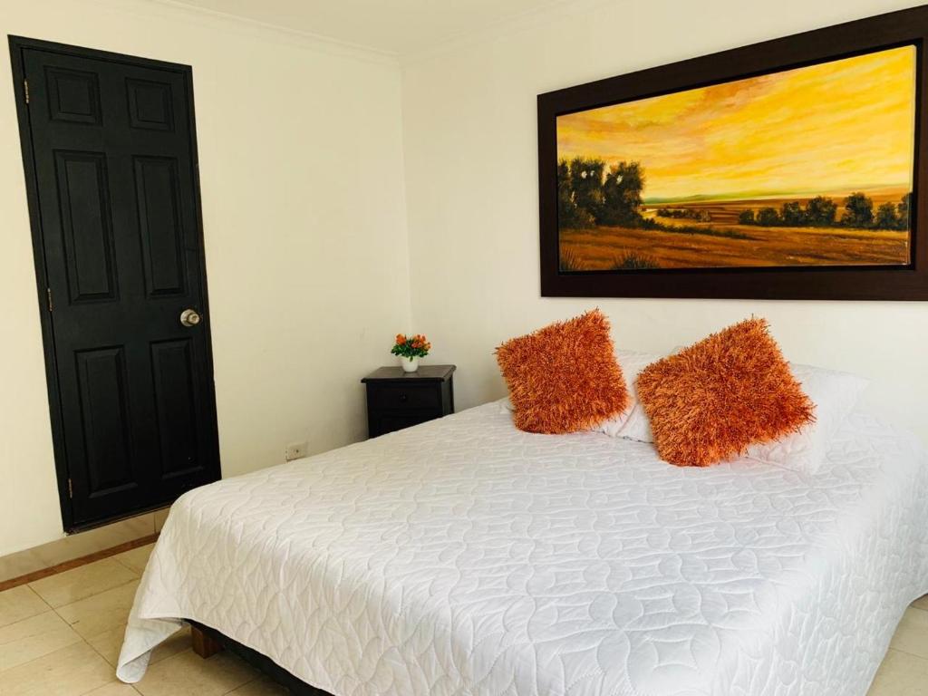 Postel nebo postele na pokoji v ubytování Hotel Lleras Premium #1