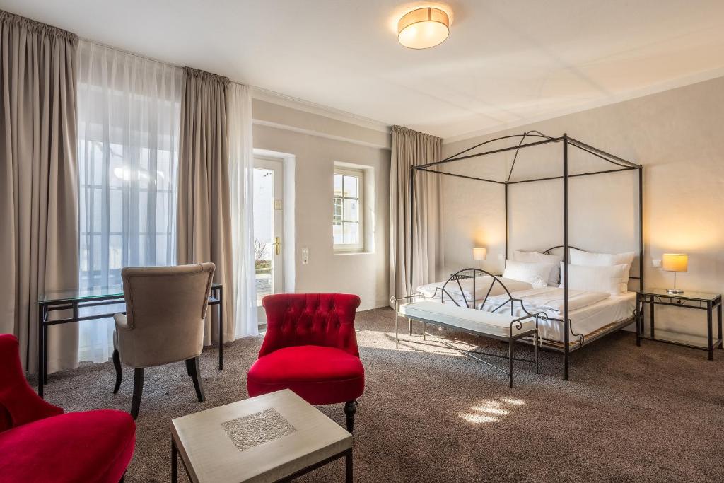 Postel nebo postele na pokoji v ubytování Hotel Annaberg