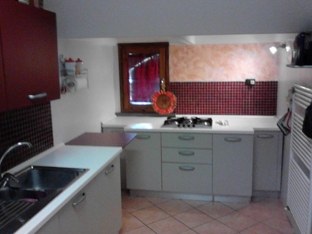 Kuchyň nebo kuchyňský kout v ubytování B&B La Serra