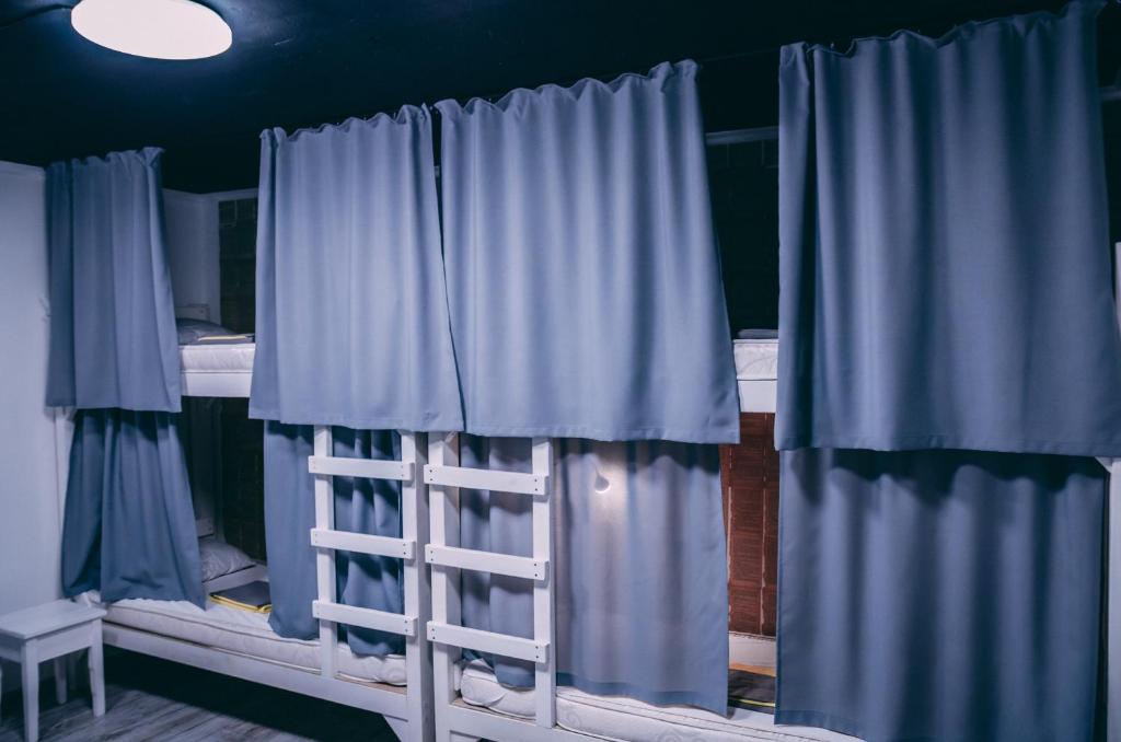 Postel nebo postele na pokoji v ubytování Smart Hostel
