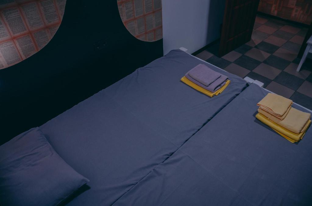 Postel nebo postele na pokoji v ubytování Smart Hostel