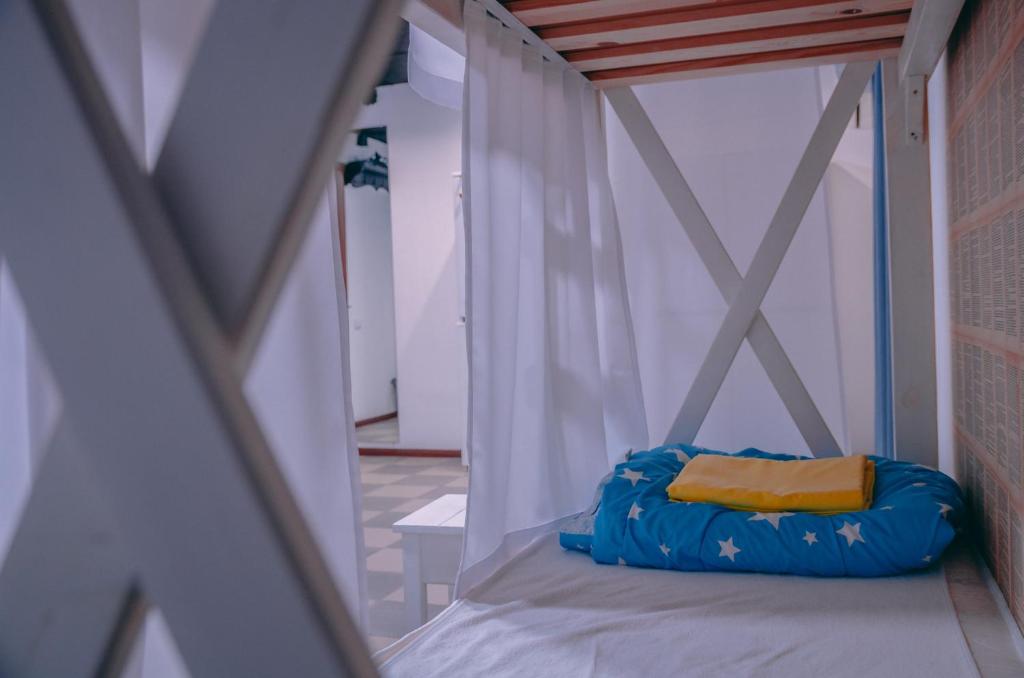 Postel nebo postele na pokoji v ubytování Smart Hostel