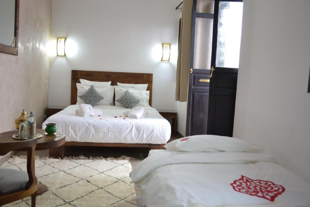 Letto o letti in una camera di Riad le Voile d'Orient