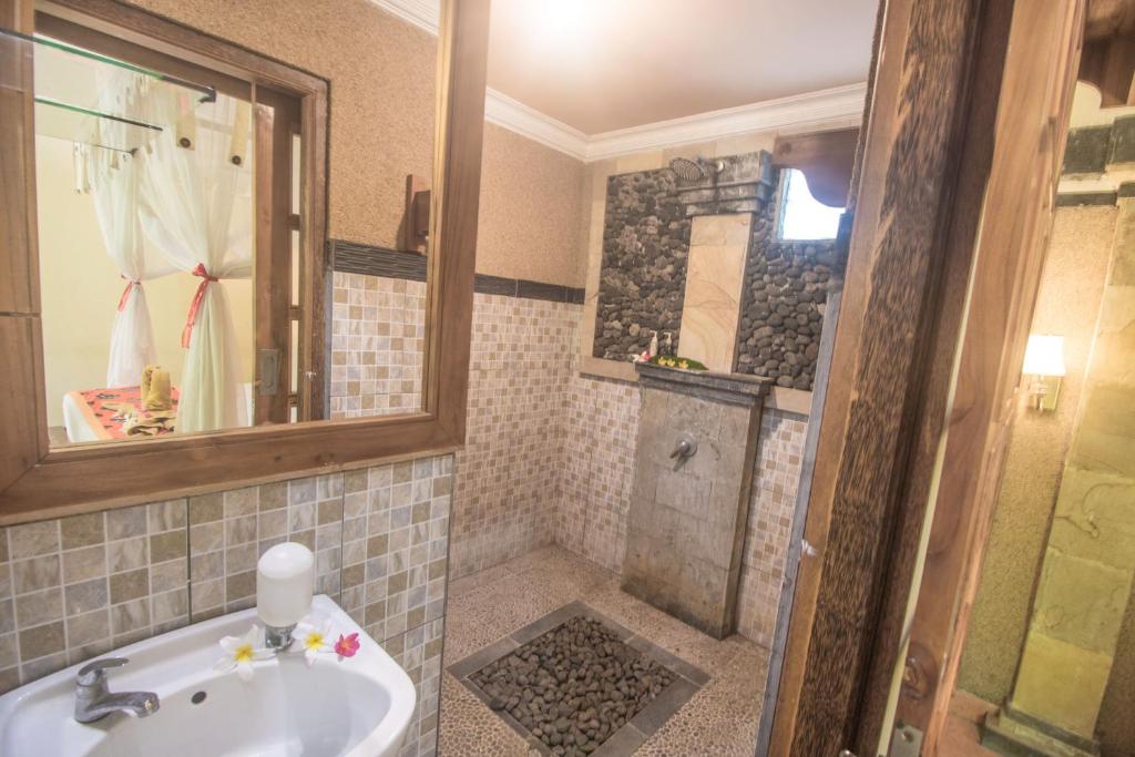 Koupelna v ubytování Trijaya Guest House Pemuteran